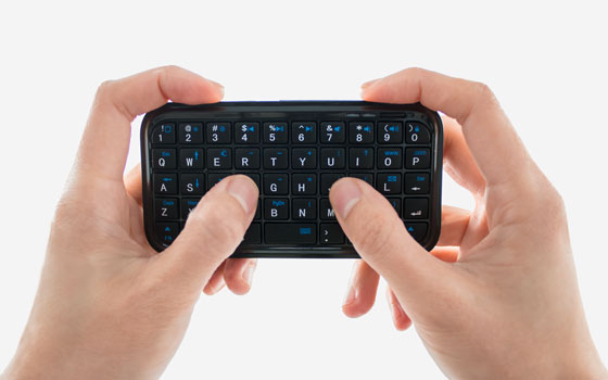 Mini Bluetooth Keyboard in hands