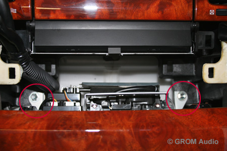 Installation of GROM USB MP3 and iPod adapter into Lexus SC430 2006 - unscrew two bolts behind AC controls
